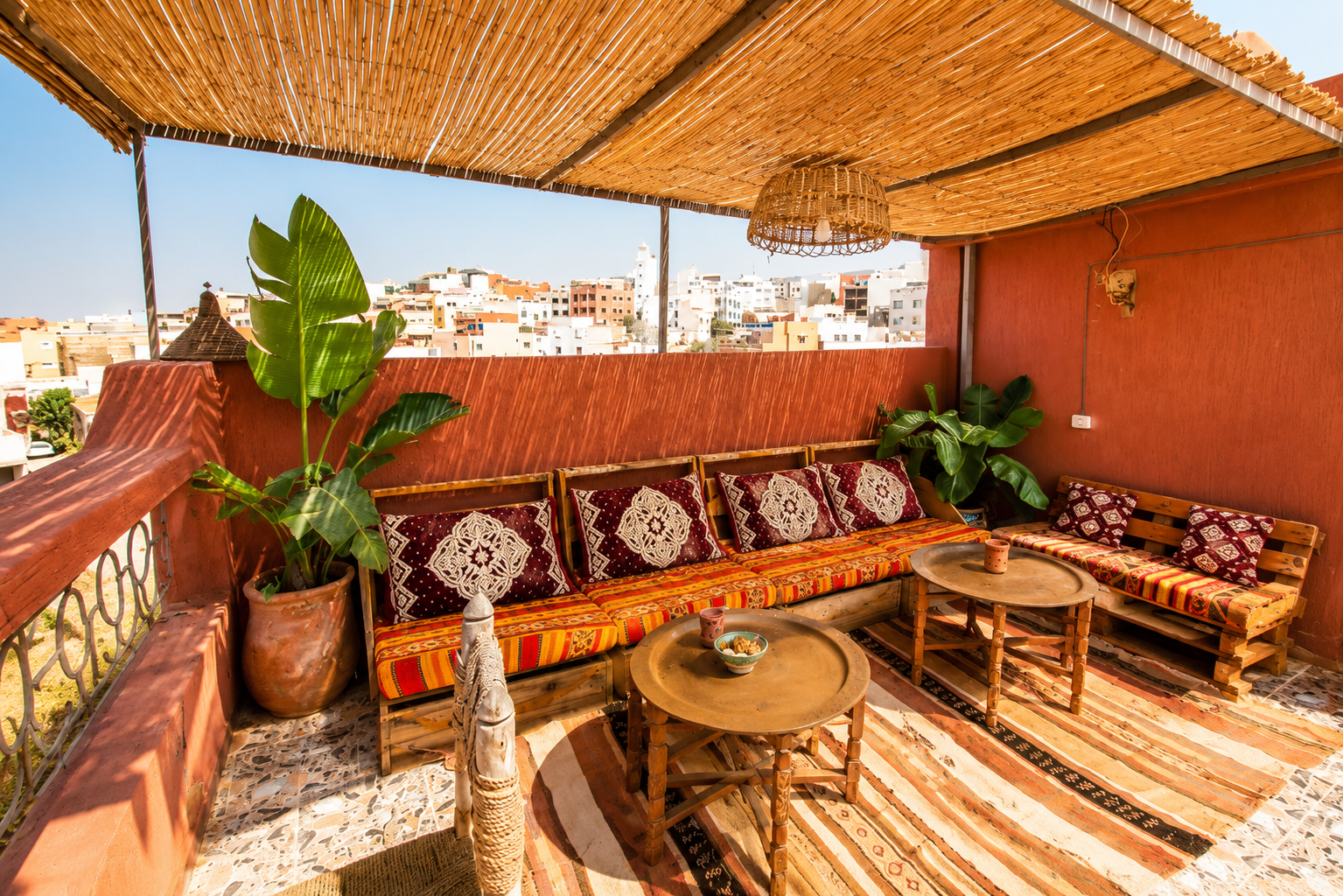 Relaxing rooftop lounge terrace at a surf camp in Tamraght Morocco